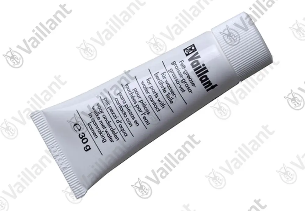 Weißes Tubenprodukt mit Schraubkappe, beschriftet mit "Vaillant", enthält Angaben zu Anwendung und Inhaltsstoffen auf verschiedenen Sprachen. Menge 30 g.